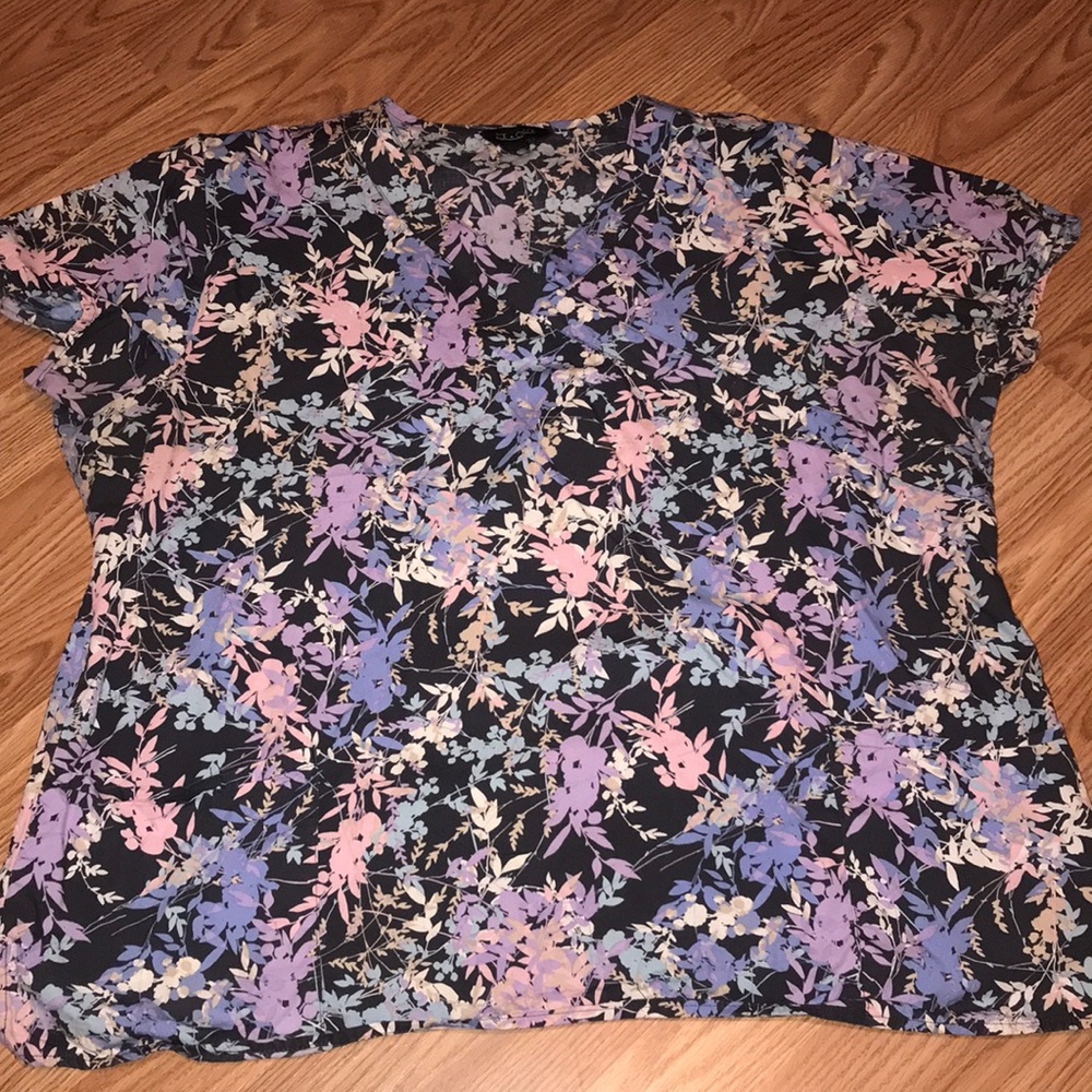 Scrub top with multicolor leaves and flowers